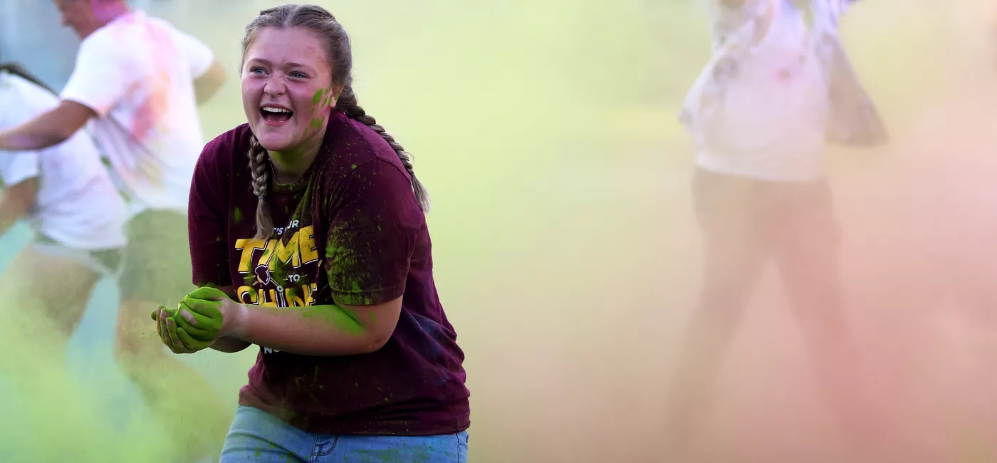 Female student participating in activity